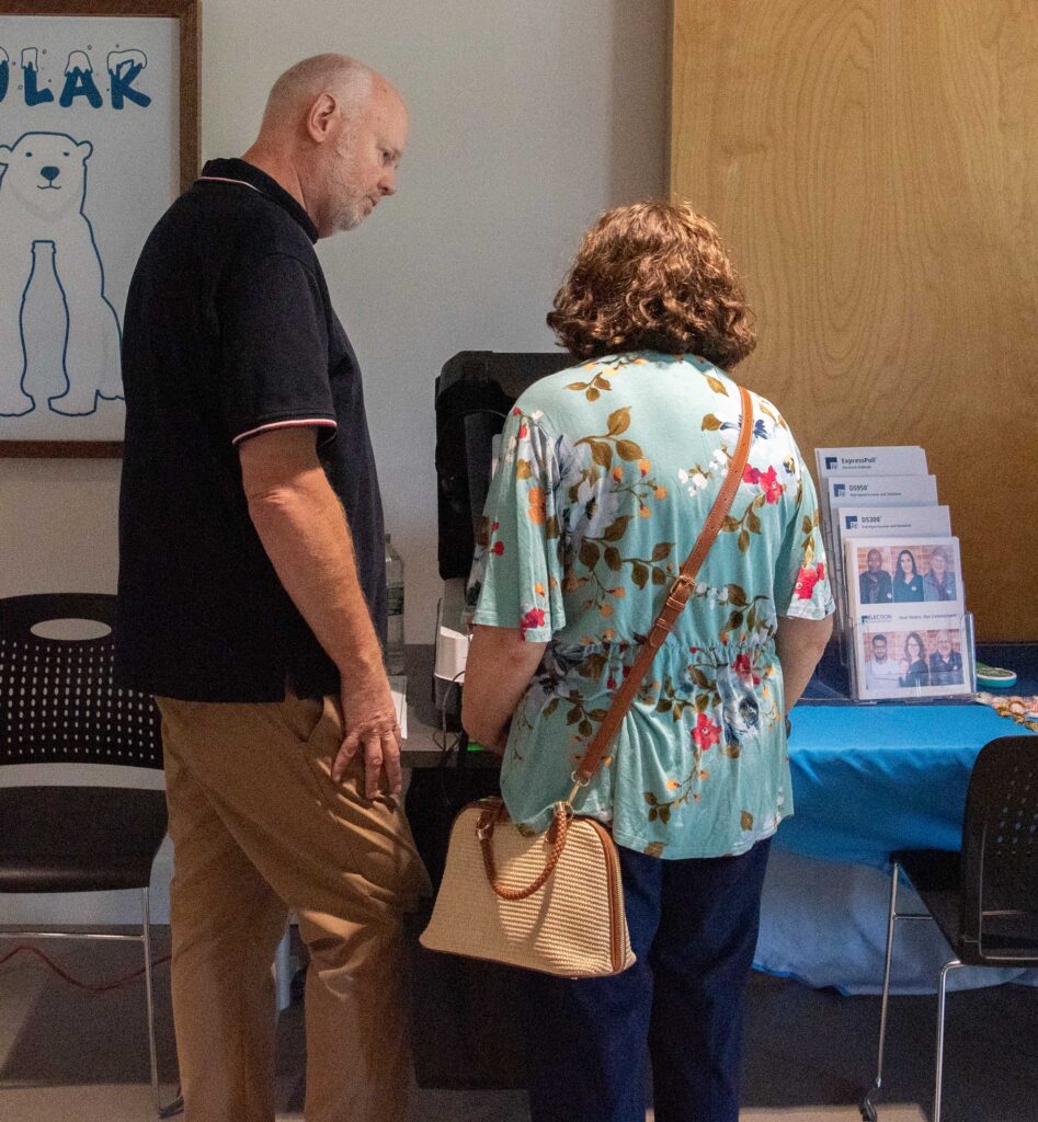 Attendee looking at AutoMARK